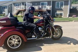Kari Rankins riding her motorcycle
