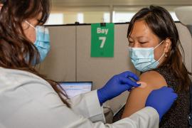 Rush staff member getting vaccinated