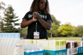 Rush social worker at a school-based health center event