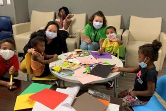 Children at a free flu vaccine clinic