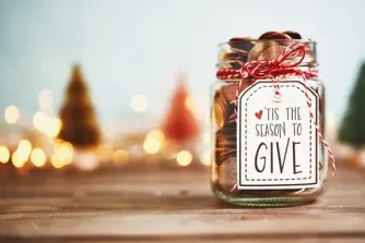 Giving jar full of coins