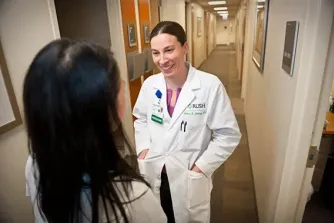 Dr. Summer Dewdney speaking with patient