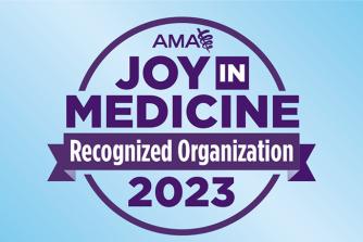 purple logo in front of a blue background that reads 'joy in medicine recognized organization 2023'