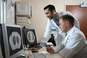 Dr. Andrew Arndt and Dr. Gaurav Marwaha reviewing images