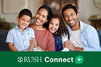 Family of four people smiling