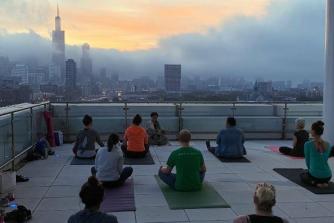Yoga on the roof at Rush