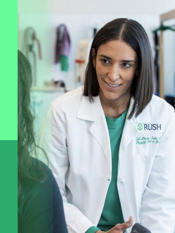 A Rush doctor looks at a patient.