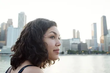 Woman in front of Chicago skyline