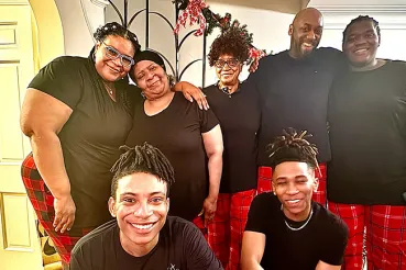 Maya, Kevin, their three sons and her parents