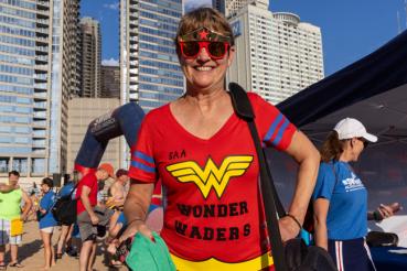 Patty Piasecki, NP, stands ready at Ohio Street Beach for the 2023 Swim Across America Chicago Open Water Swim in Lake Michigan, benefitting the RUSH Cancer Center.