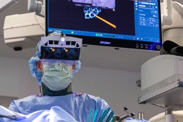 Spine surgeon using special imaging headset