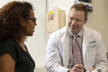 Keith Hood, MD, with patient