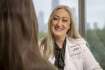ENT specialist Kristal Brown, MD, with patient