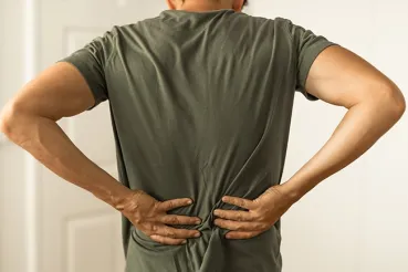 Man experiencing lower back pain