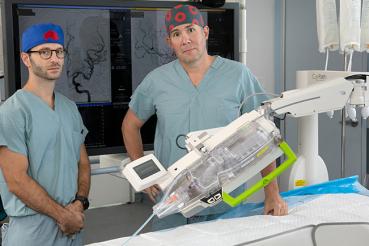Stephan Munich and R. Webster Crowley with CorPath robot