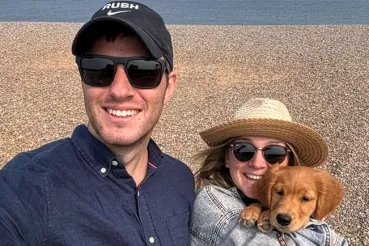 Ned Barker with partner and dog