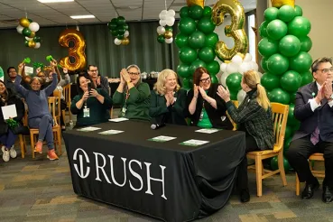 Rush Oak Park nurses and CEO Dino Rumoro, DO, celebrate the hospital's Magnet designation