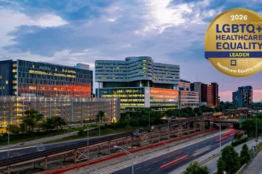 Rush Tower and Rubschlager Building with HEI logo superimposed on top right
