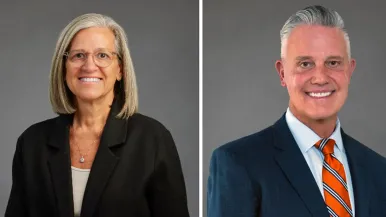 Rush College of Nursing alumni Julie Hoff, PhD, RN, FNAP, FAAN, and Steven Brockman-Weber, DNP, RN, MSHSA, FACHE, NEA-BC, CENP