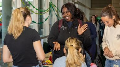 Students mingle at the Fall into Rush event