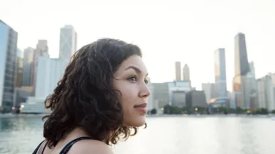 Woman in front of Chicago skyline