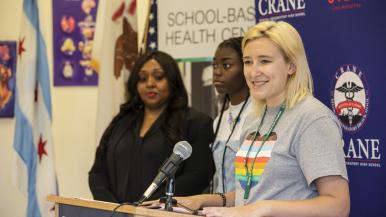 RUSH social worker joins student and principal at anti-violence event