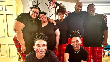 Maya, Kevin, their three sons and her parents