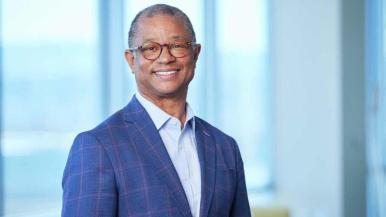 Ted Love poses on Rush University's campus.