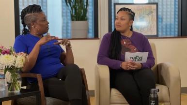 Jazmine Lampkin interviews a guest during her podcast.