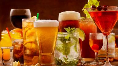 Assorted alcoholic drinks arranged on a table