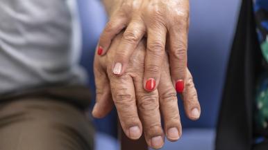 Hands of a patient and loved one
