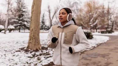 Woman running in the cold