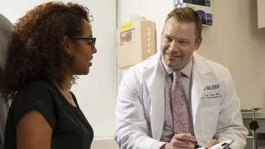 Keith Hood, MD, with patient