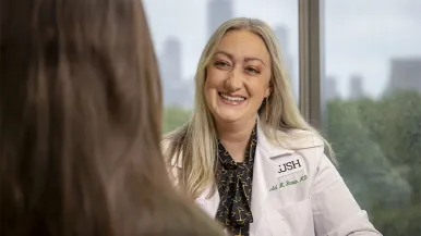ENT specialist Kristal Brown, MD, with patient