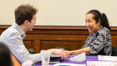 Live Health Chicago blood screening event with young man and female patient