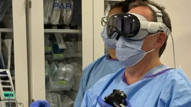 Irving Waxman, MD, using VR goggles