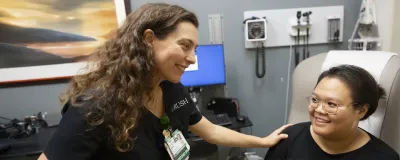 Rush cancer provider with a patient