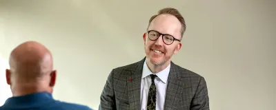 David Reid, MD, with patient