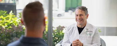 Dr. Derweesh with a patient