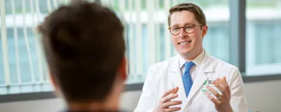 Dr. Reisz with a patient