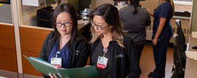 Rush nurses reviewing patient records