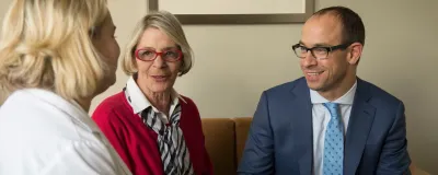 Dr. Seder talking to a patient
