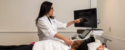 Dr. Stempel with a patient