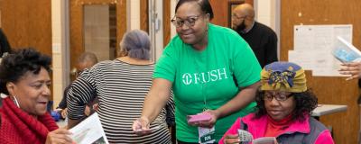 RUSH employee volunteer at senior bingo