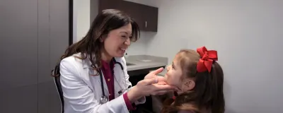 Dr. Zarzuela with young patient