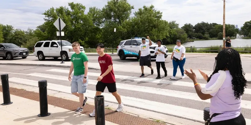 A group of people in a crosswalk