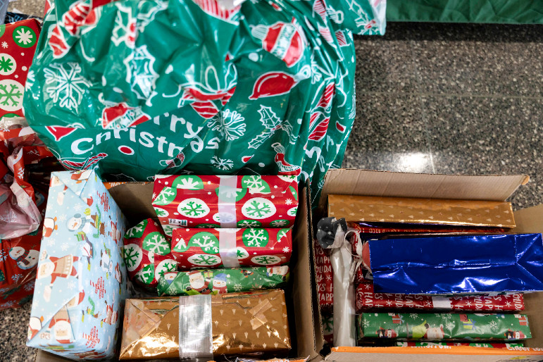Close-up view of gifts wrapped in colorful paper